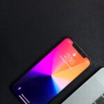 black iphone 5 on black textile