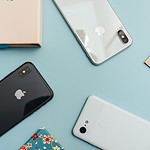 space gray iPhone X on blue surface