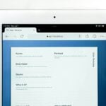 a white rectangular device with a screen