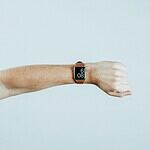 person wearing Apple watch