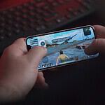 person holding black samsung android smartphone