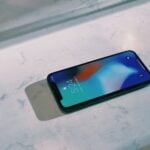 turned on silver iPhone X