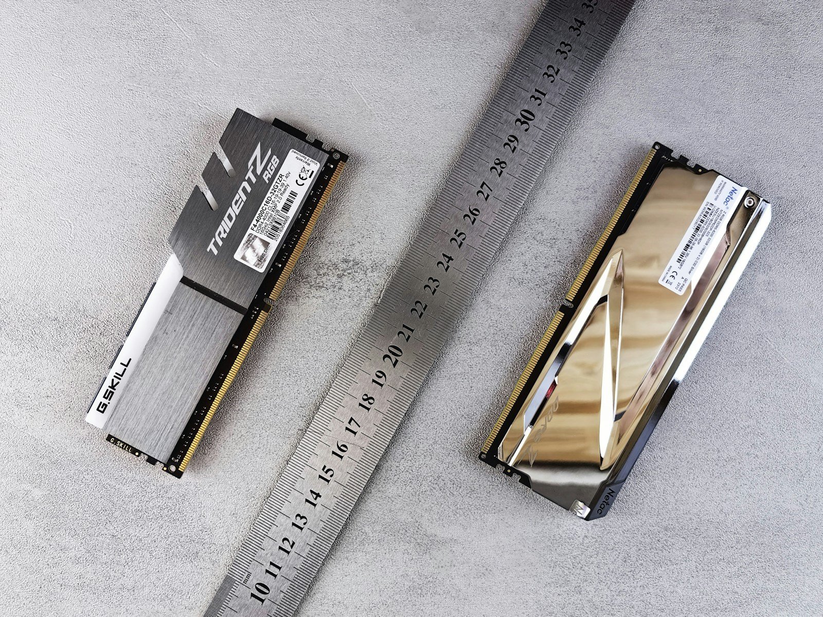 a close up of a ruler and a memory card