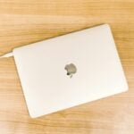 MacBook in flat lay photography with white case