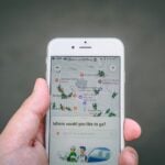 person holding silver iPhone 6