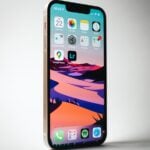 a cell phone with a cracked screen