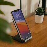 black android smartphone on brown wooden table