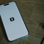 A close up of a cell phone on a table