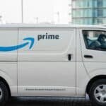 a white van with the amazon prime logo on it