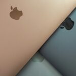 Apple laptops in different colors.