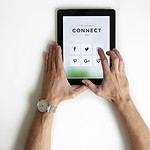 person using black iPad