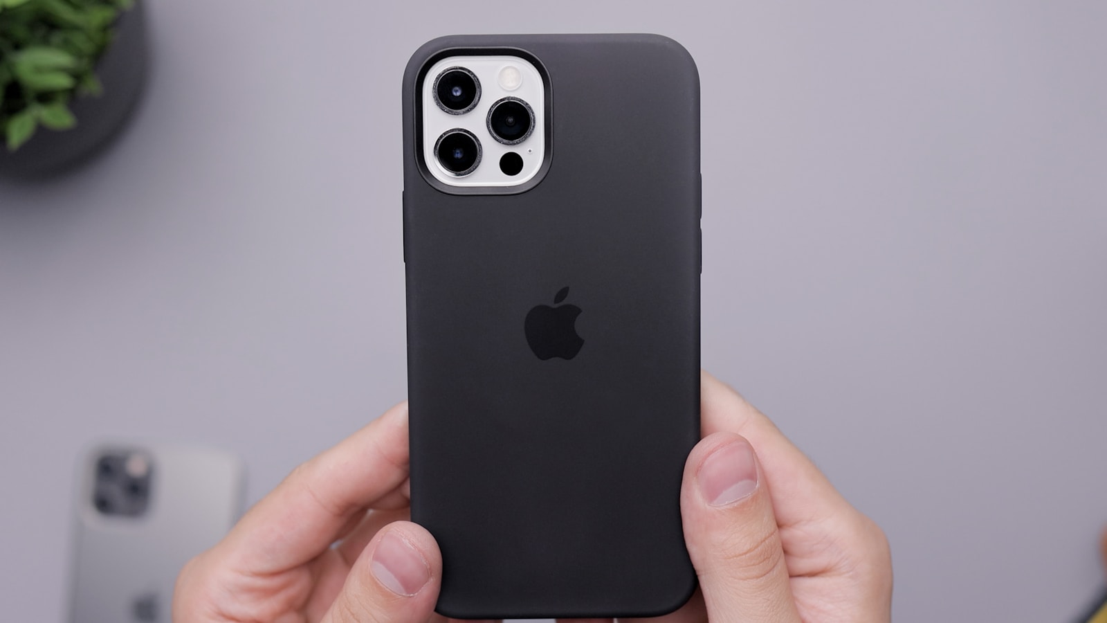 black iphone plus with black case